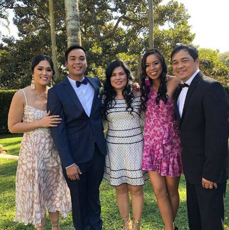 Lizette Cabrera with her parents and brother, Carl and sister, Izabo.